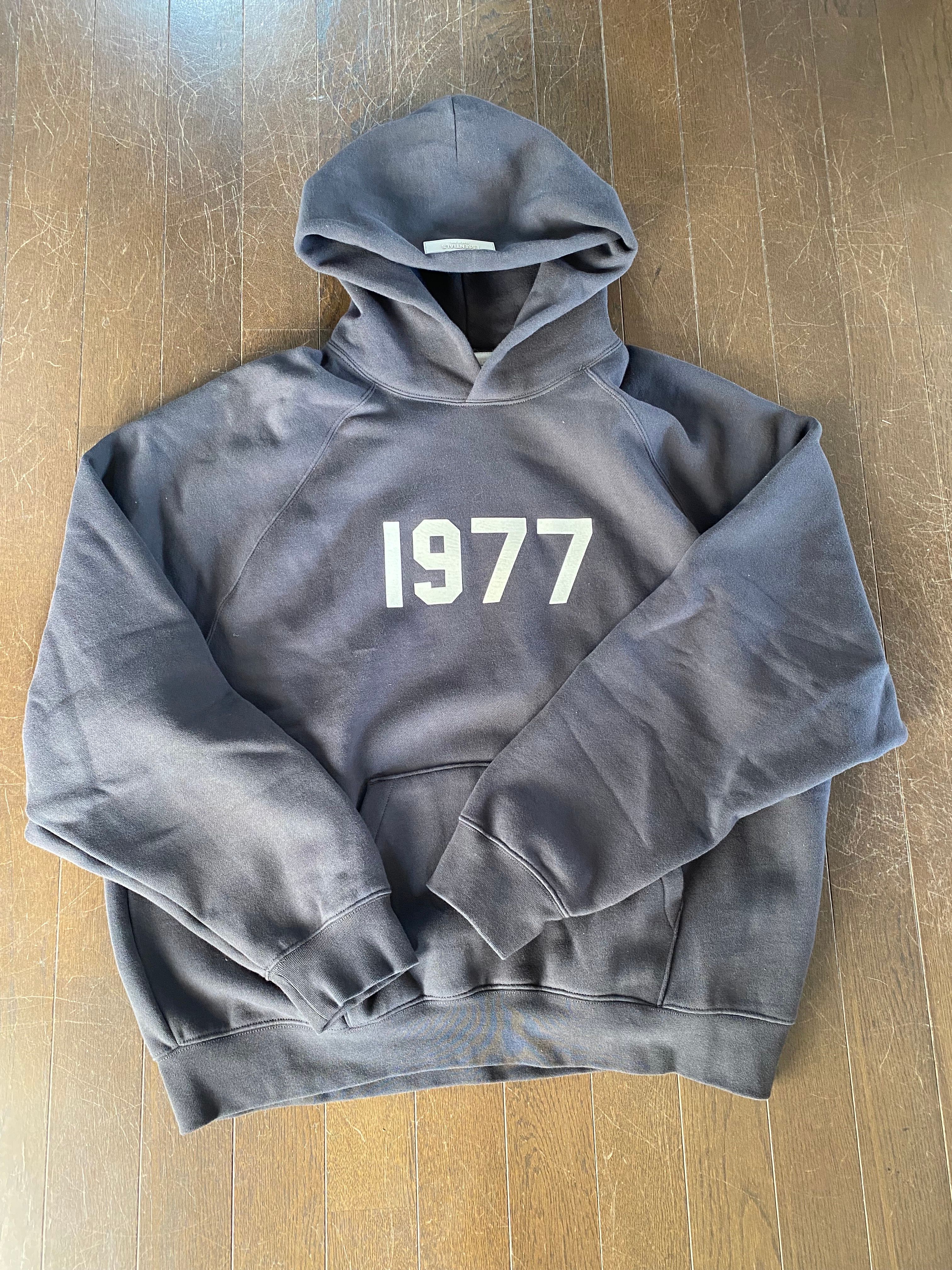 FEAR OF GOD ESSENTIALS 1977 HOODIE "Iron"