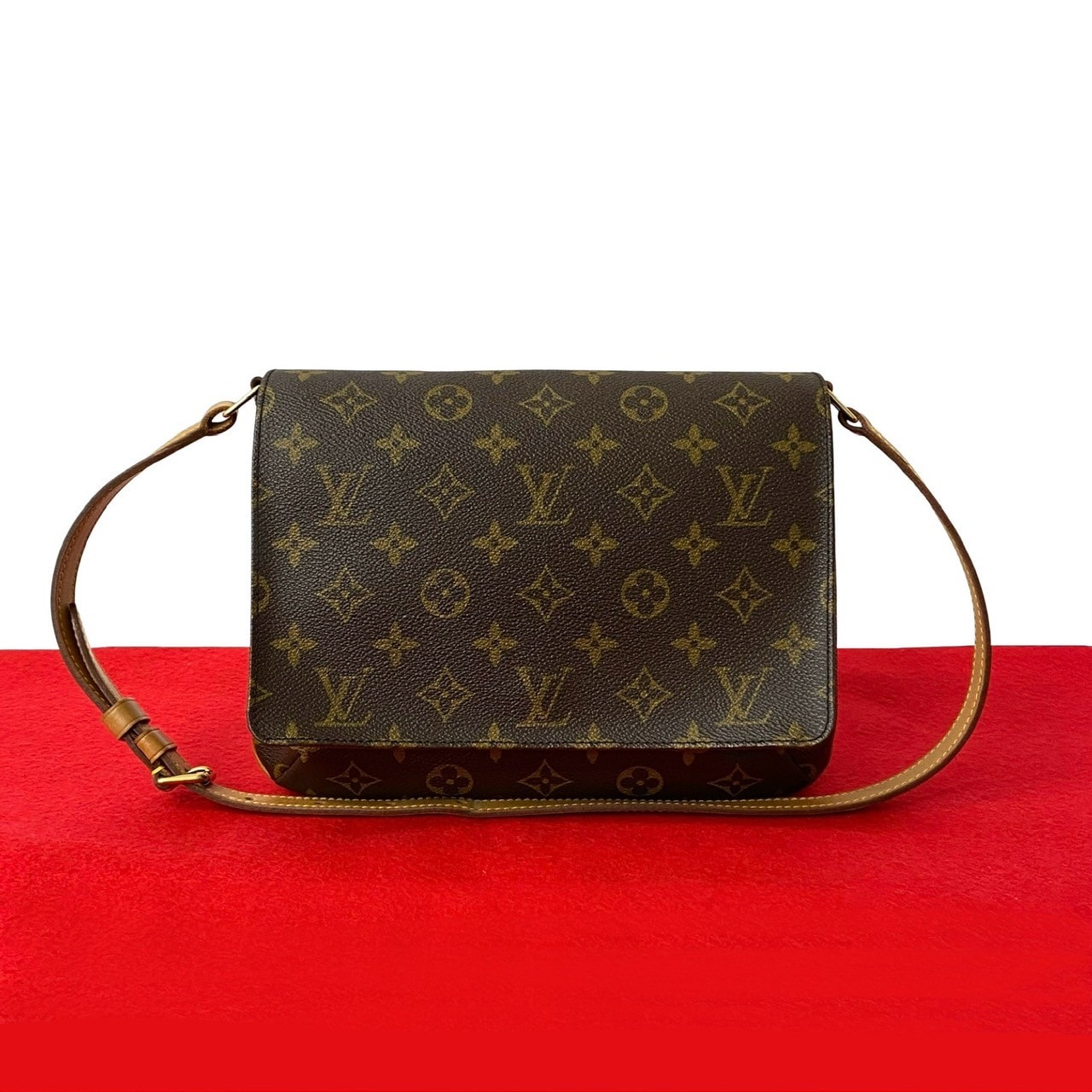 LOUIS VUITTON ルイヴィトン ミュゼットタンゴ モノグラム レザー PVC ショルダーバッグ ブラウン
 25575