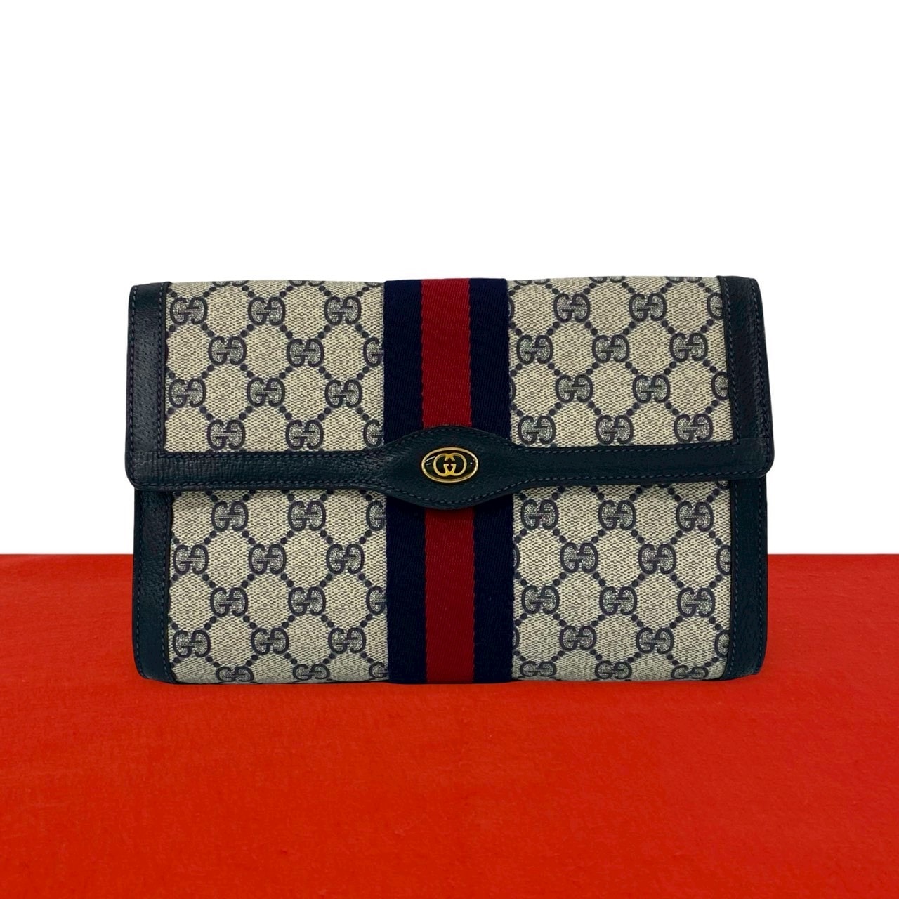 GUCCI グッチ シェリーライン GG ロゴ 金具 柄 レザー PVC クラッチバッグ ネイビー
 355-3