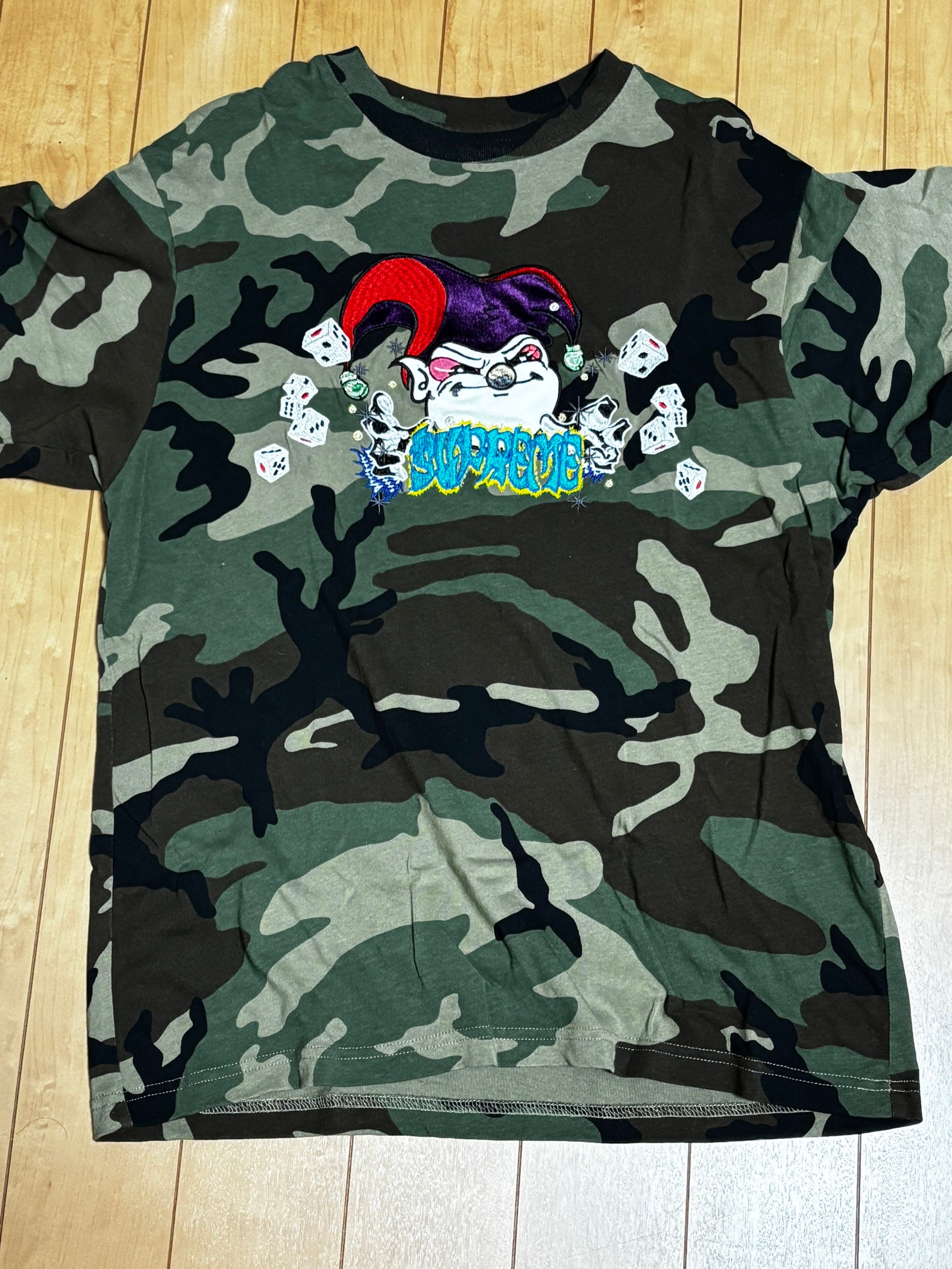 Supreme AOI Jester S/S Top "Woodland Camo"