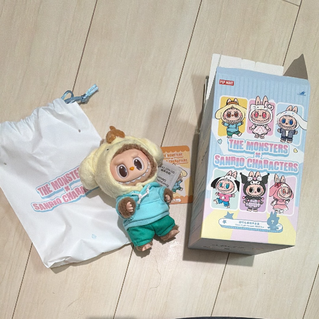 POP MART THE MONSTERS (Labubu) x Hello Kitty and Friends Series-Vinyl Plush Pendant Blind Box POMPOMPURIN