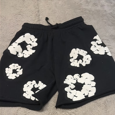 DENIM TEARS The Cotton Wreath Shorts DENIM TEARS The Cotton Wreath Shorts