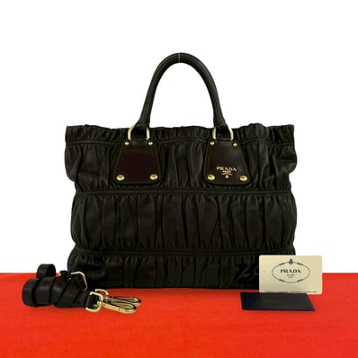 PRADA プラダ ロゴ 金具 レザー ショルダーバッグ ブラウン
59394