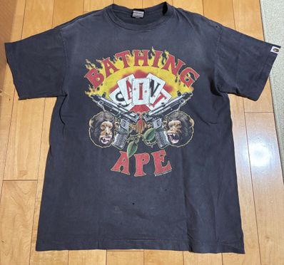 SAINT Mxxxxxx x A BATHING APE Guns Tee "Charcoal"