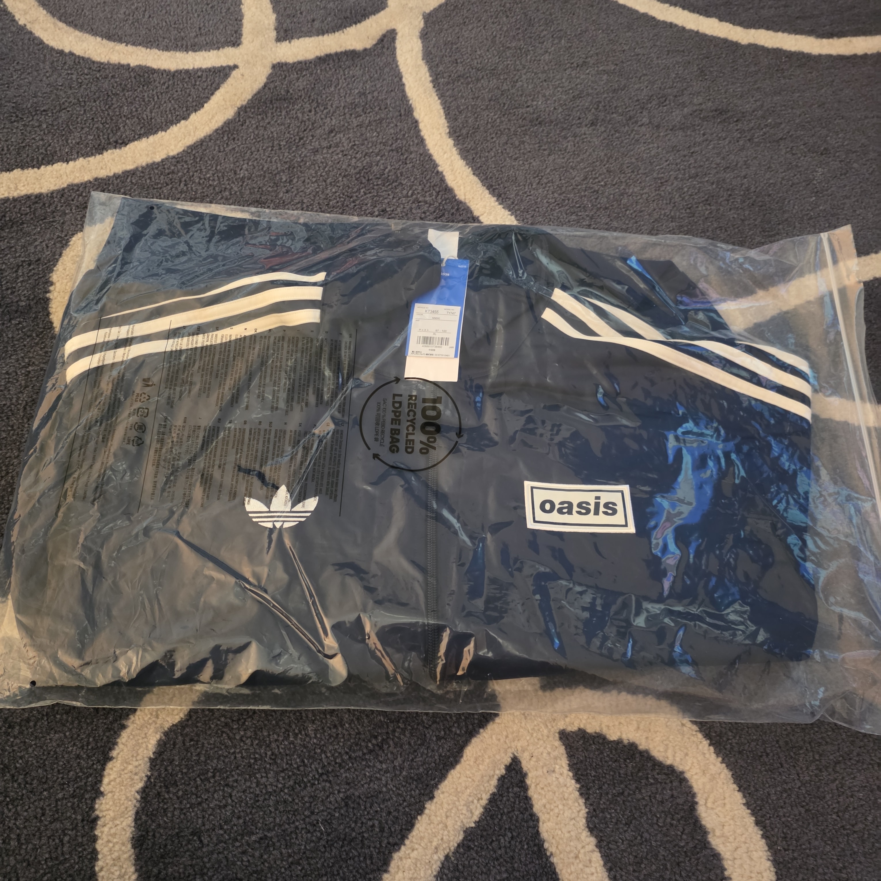 アディダス x オアシス ツアー ファイヤーバード トラックトップ "ナイトインディゴ"