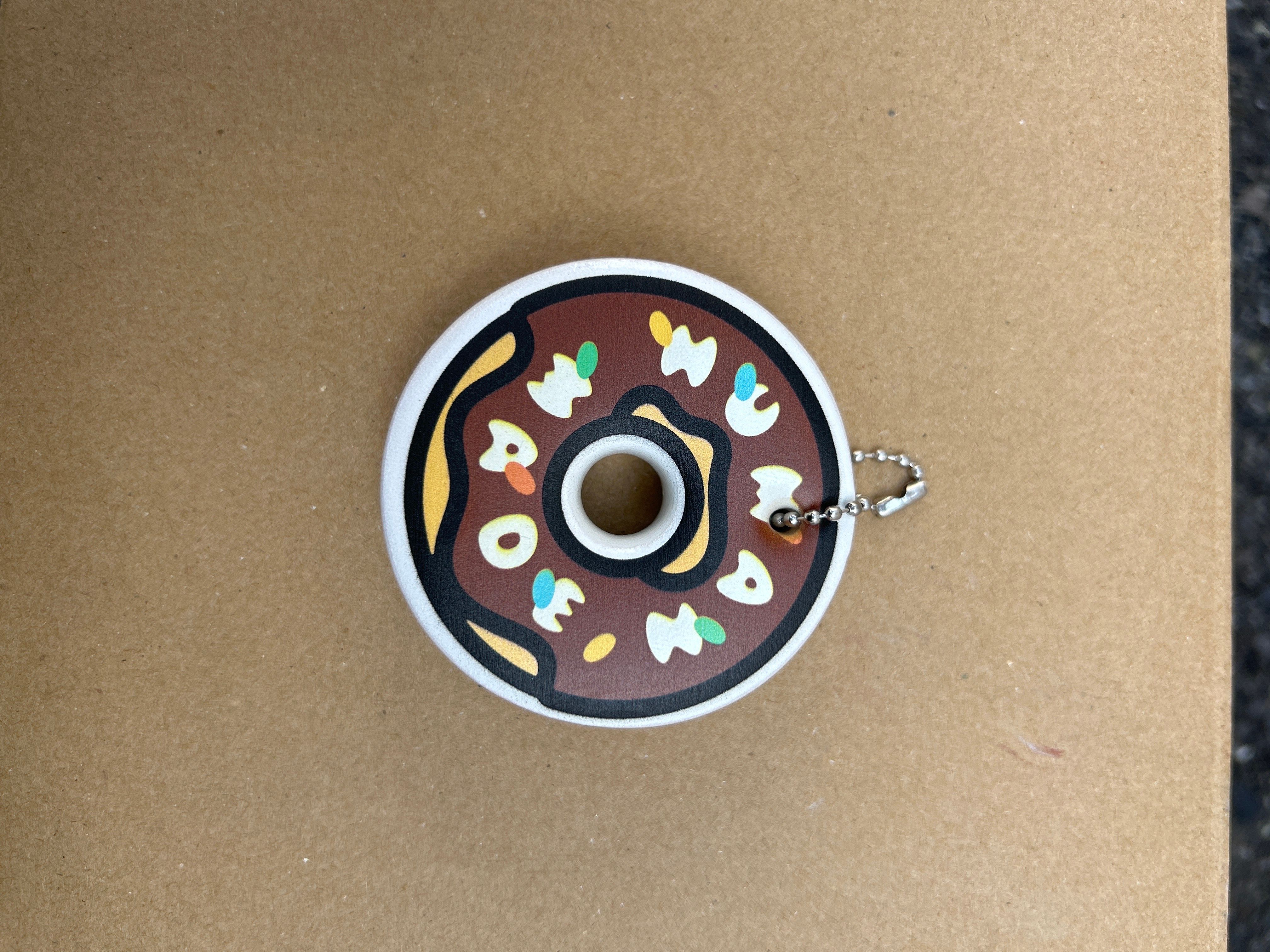 HUMAN MADE x Krispy Kreme Doughnuts Keycharm "Brown"