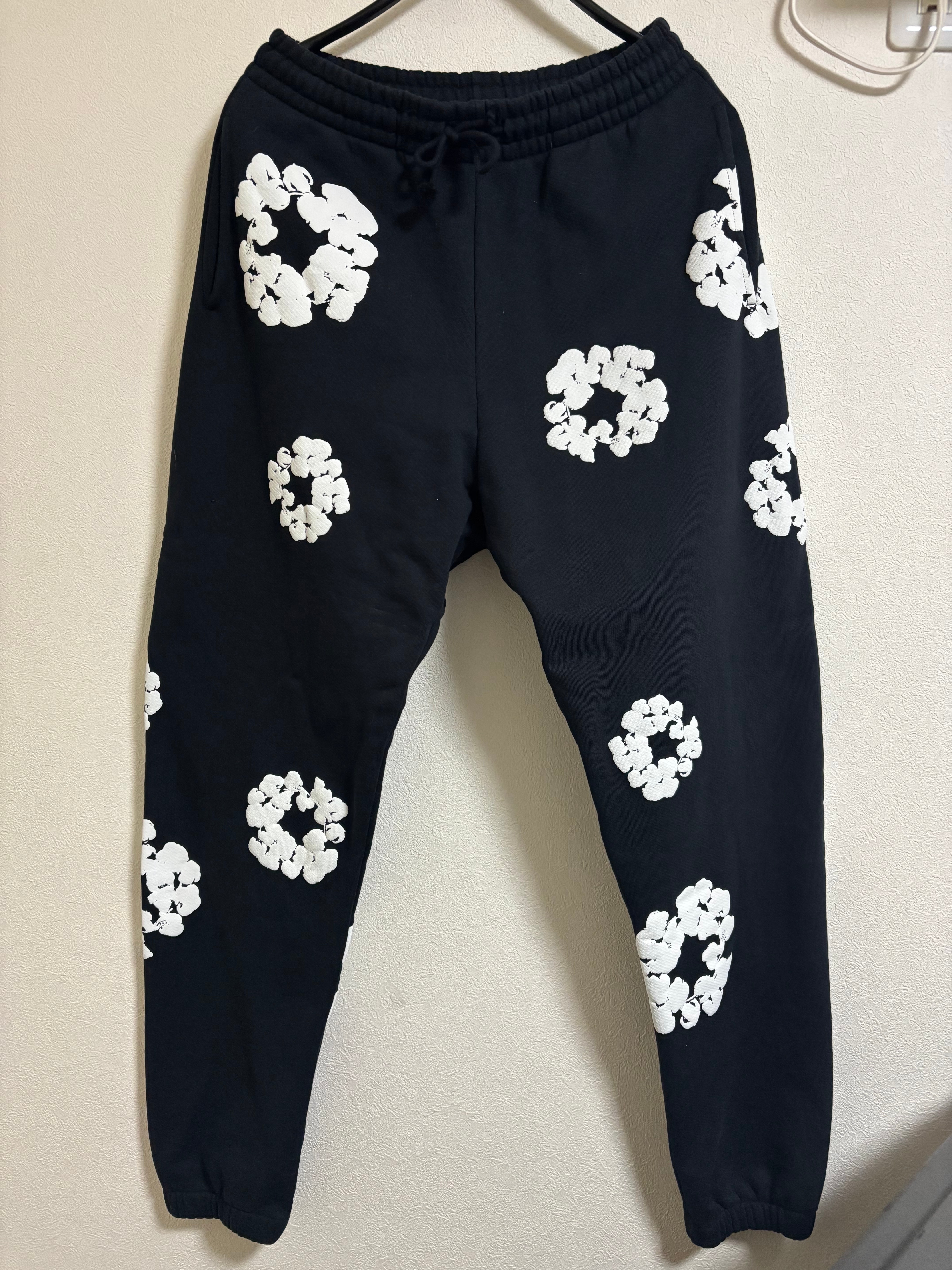 DENIM TEARS The Cotton Wreath Sweat Pants "Black"