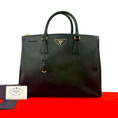 PRADA プラダ 三角ロゴ 金具 レザー ハンドバッグ ブラック
39501