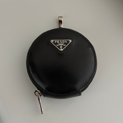 PRADA Brushed Leather Round Mini Pouch "Black"