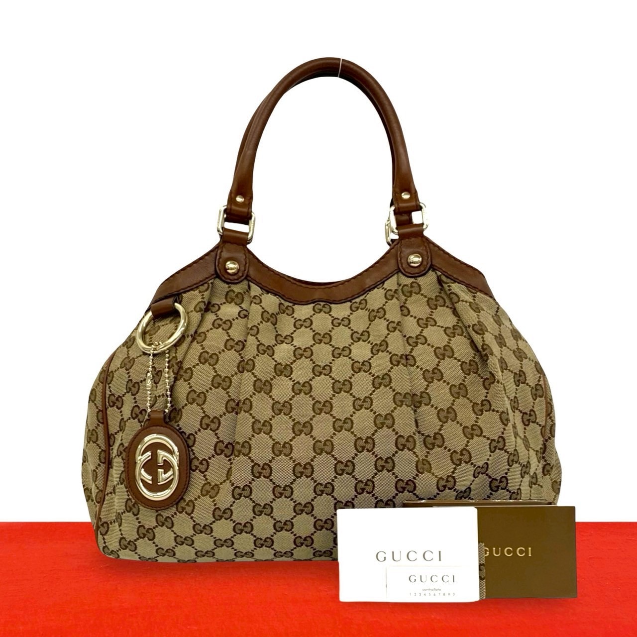 GUCCI グッチ GG ロゴ 柄 キャンバス レザー ハンドバッグ ブラウン
 40065