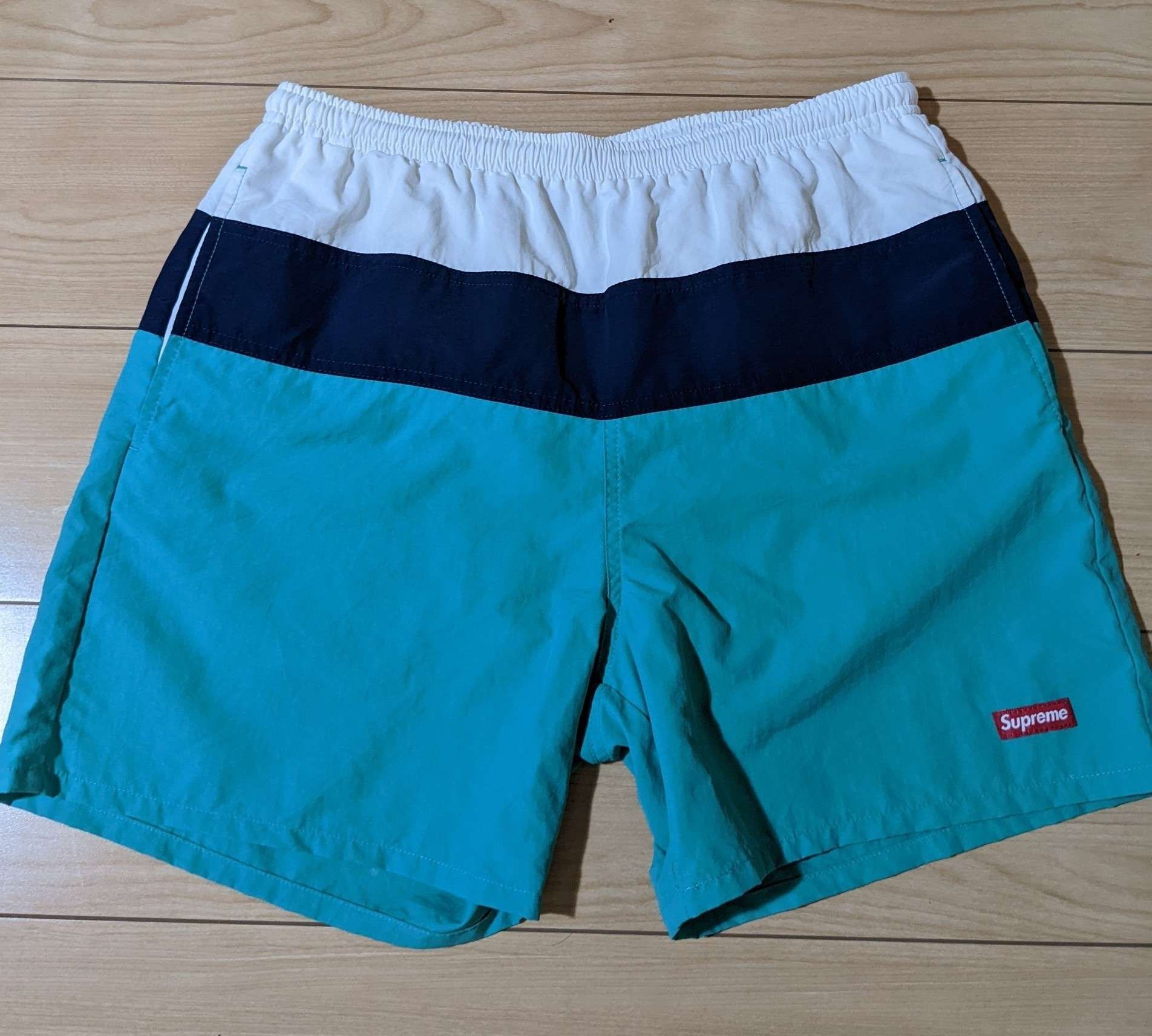 supreme split logo water short