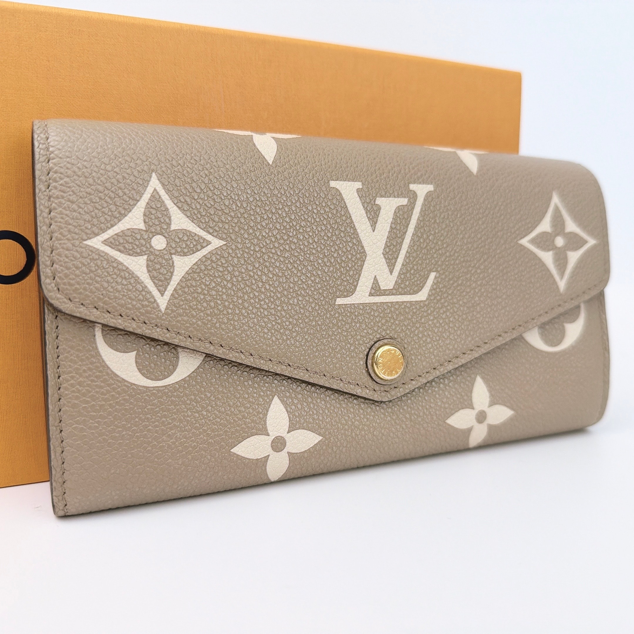 ルイヴィトン ポルトフォイユ・サラ バイカラー モノグラム・アンプラント レザー "トゥルトレール/クレーム" NMM81049