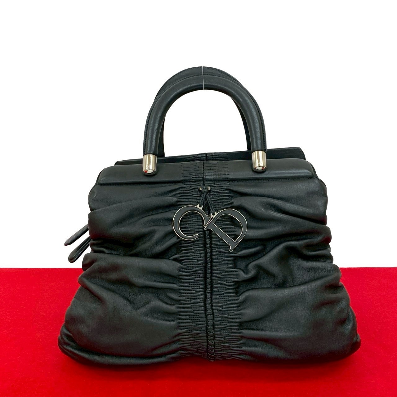 Christian Dior ディオール カレーニナ CD ロゴ チャーム 金具 レザー ハンドバッグ ブラック
 46747