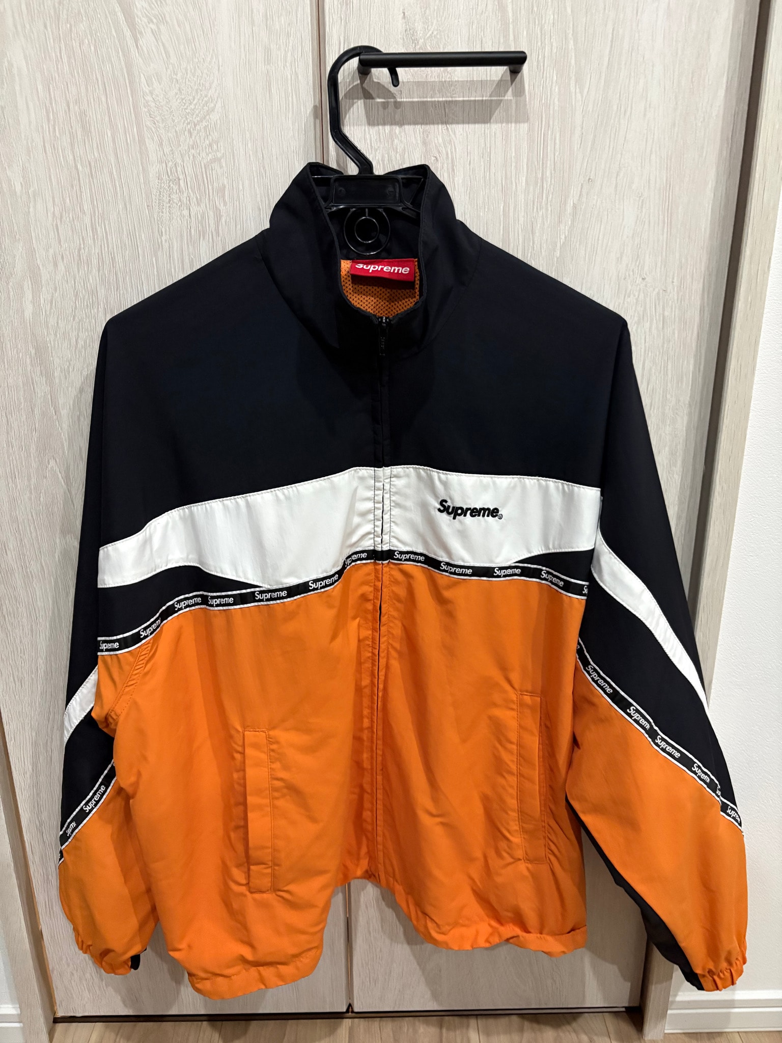 Supreme Logo Taping Track Jacket "Orange"