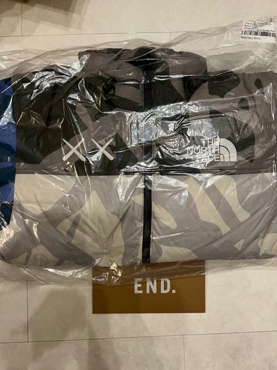 The North Face Kaws Nuptse Jacket "Grey Blue"
