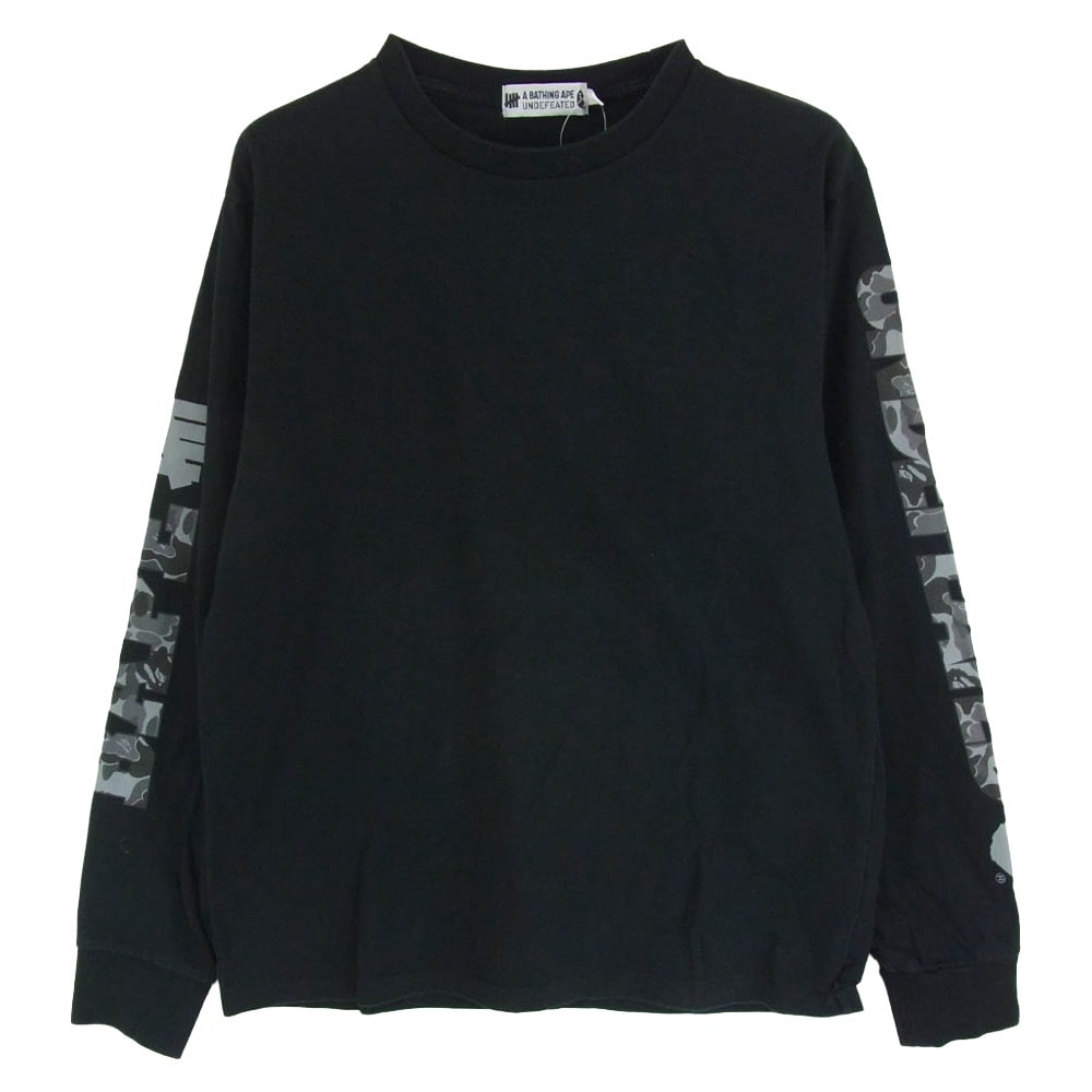 A BATHING APE アベイシングエイプ カットソー 001LTG731902X × UNDEFEATED アンディフィーテッド アームマルチ カモ ロゴプリント 長袖 カットソー ブラック系 M【中古】