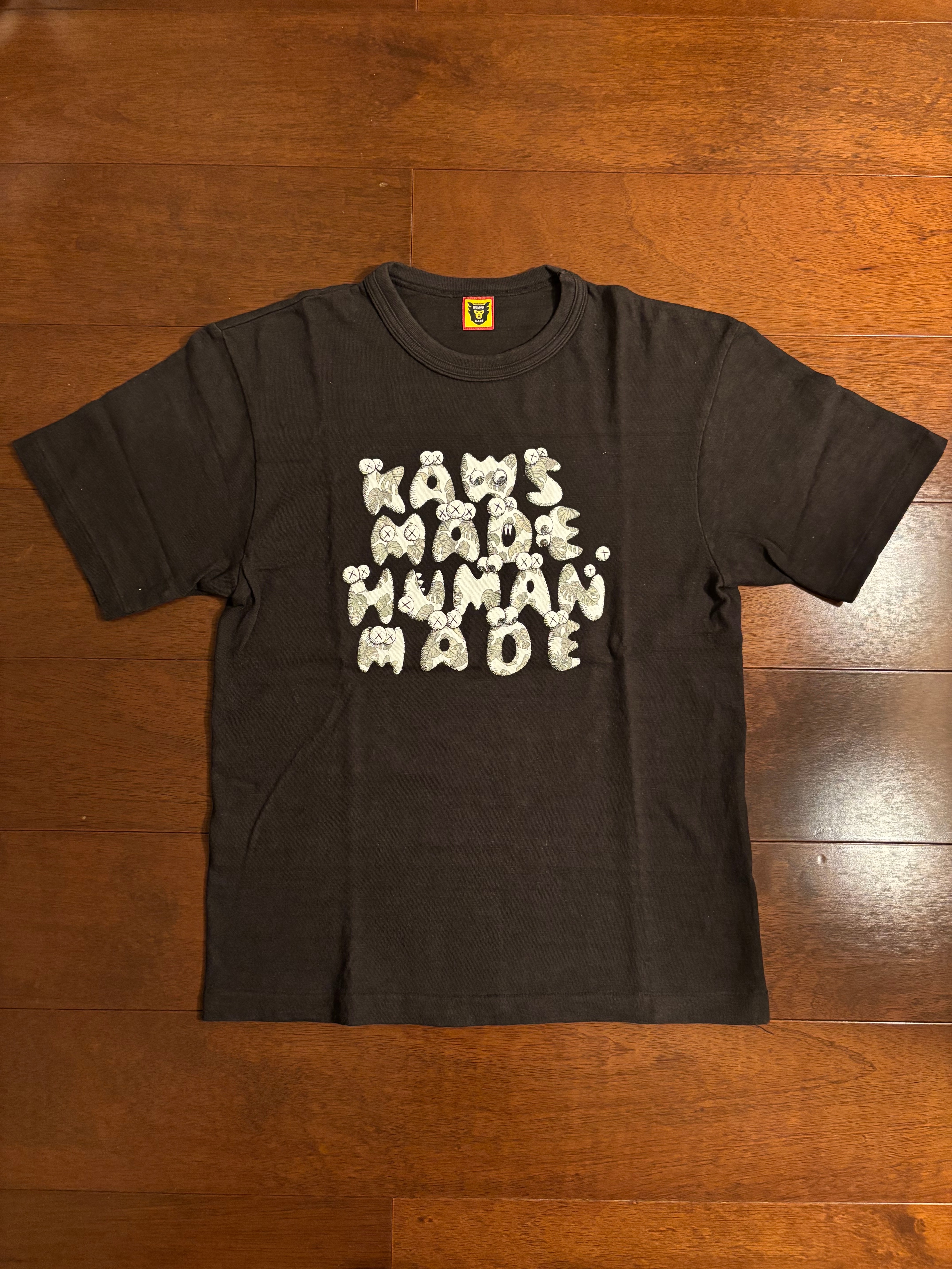 ヒューマンメイド x カウズ カウズ メイド グラフィック Tシャツ #4 "ブラック" XX27TE017