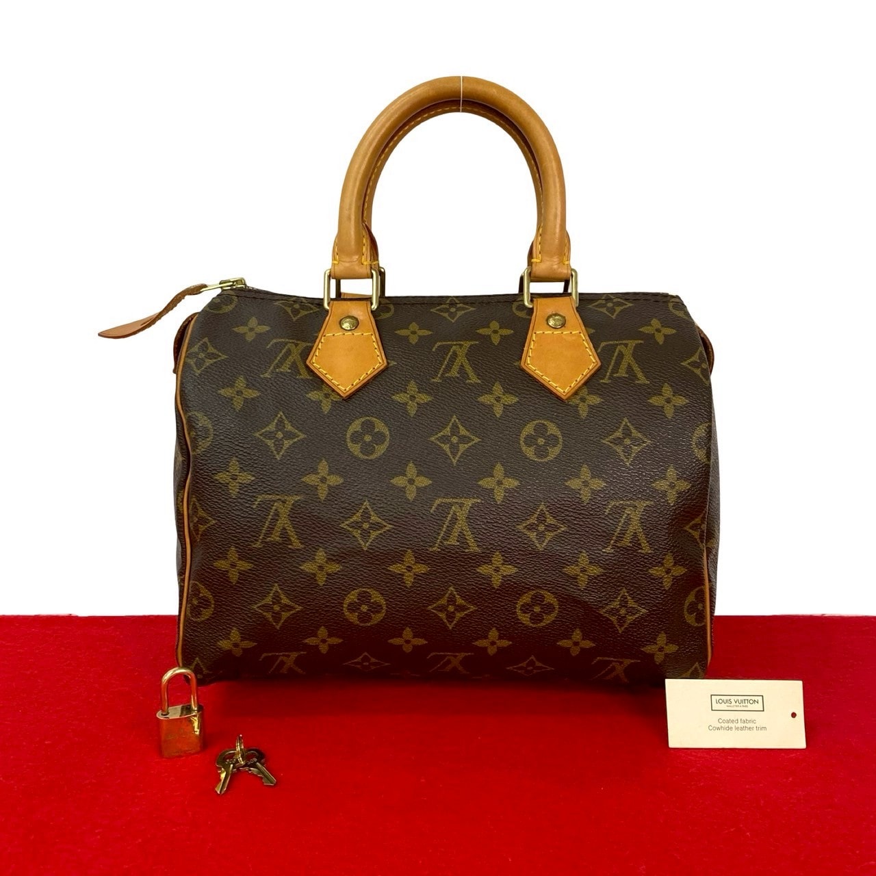 LOUIS VUITTON ルイヴィトン スピーディ 25 モノグラム レザー PVC ハンドバッグ ブラウン
 98584