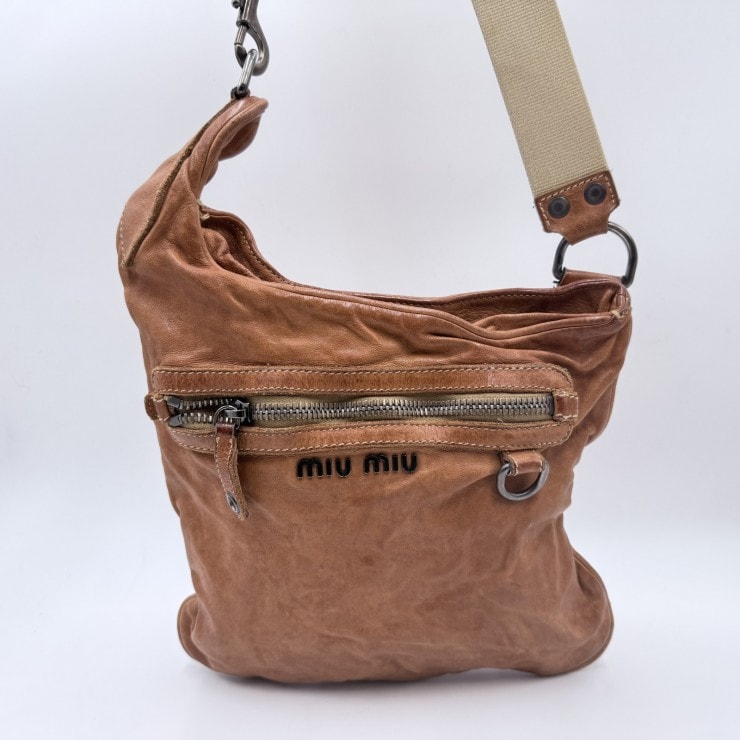 MIU MIU(ミュウミュウ)アーカイブ レザーショルダーバッグ/クロスボディバッグ ロゴ金具 ブラウン系 キャンバスストラップ レディース
