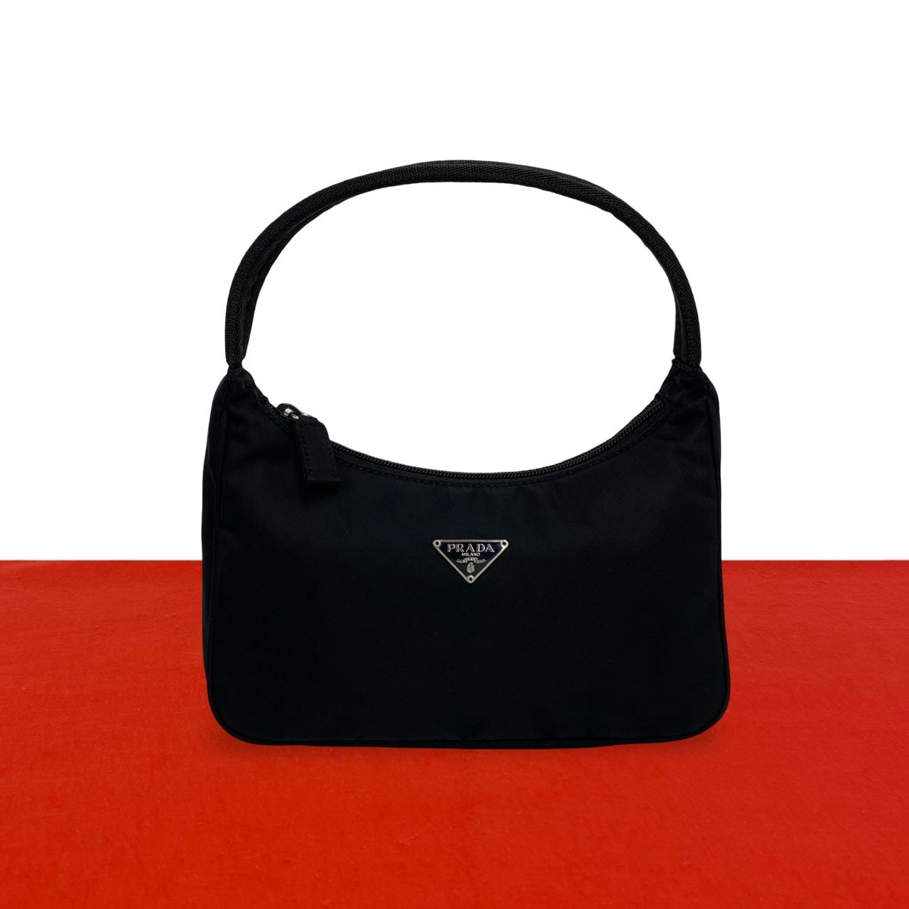 PRADA プラダ 三角ロゴ 金具 ナイロン ハンドバッグ ブラック
47804
