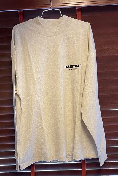 FEAR OF GOD ESSENTIALS BLACK ESS LOGO LS TEE "Light Oatmeal"