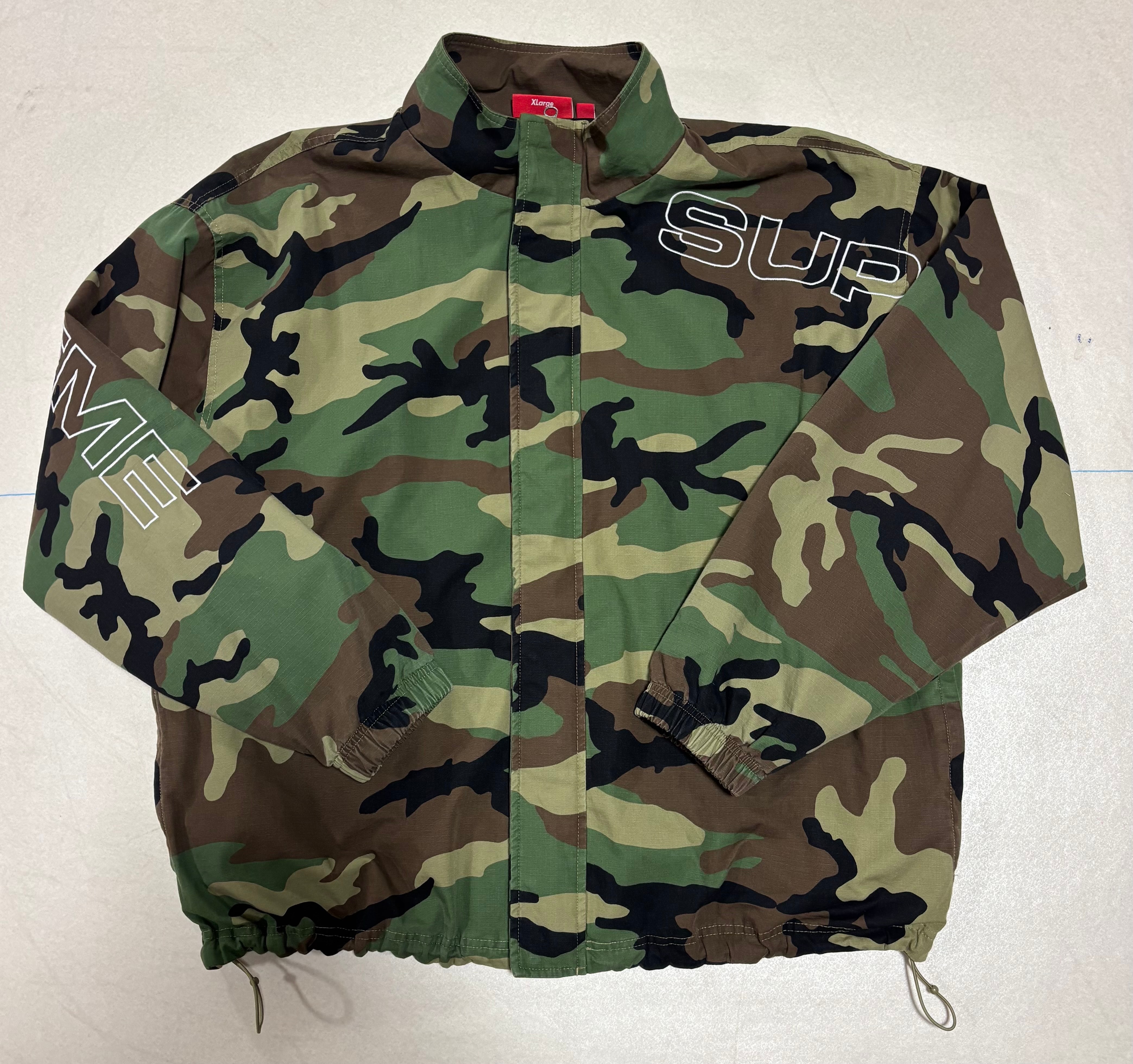 Supreme Spellout Embroidered Ripstop Track Jacket "Woodland Camo"