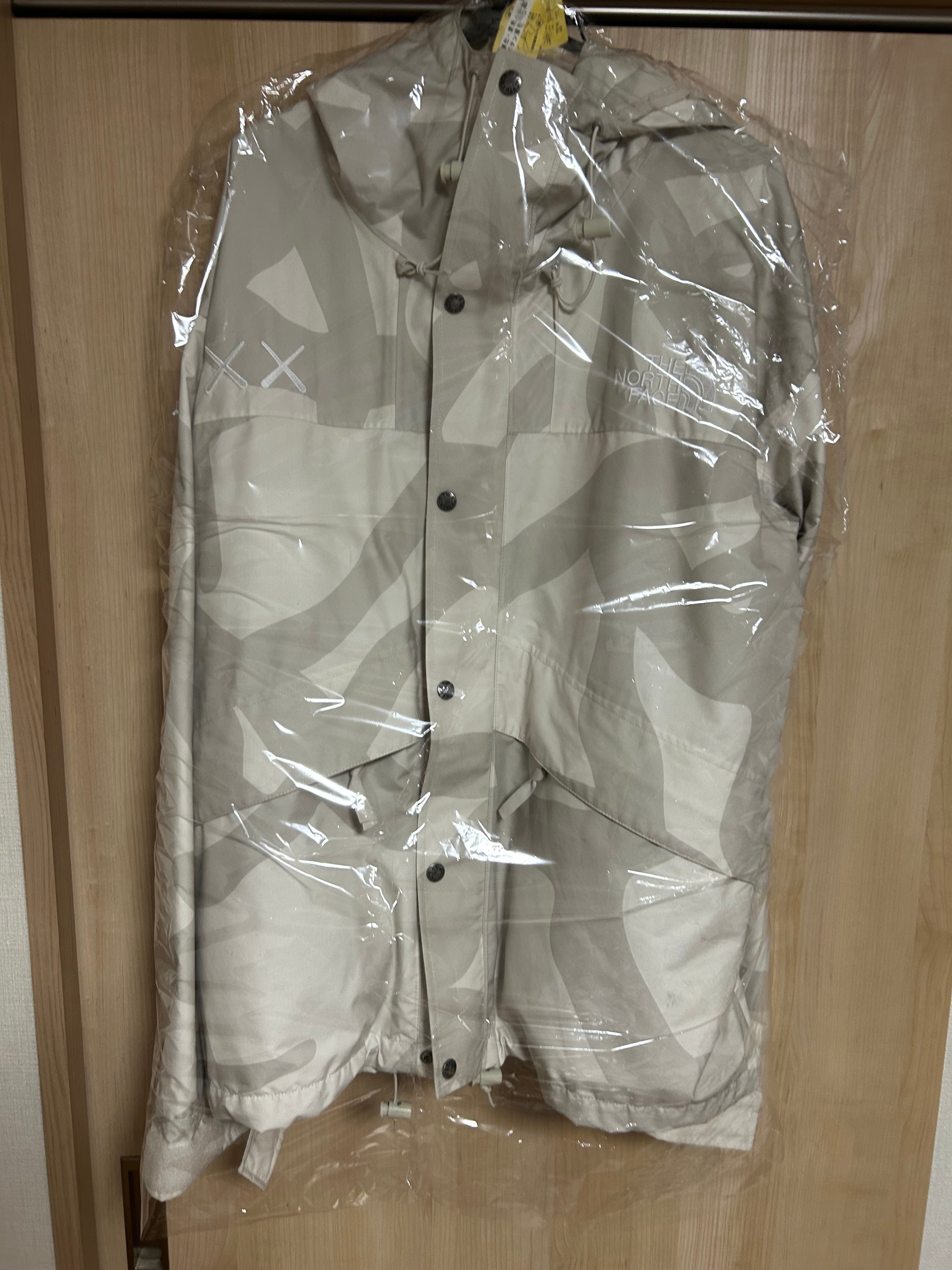 The North Face Kaws Retro 1986 Mountain Jacket "Moonlight Ivory"