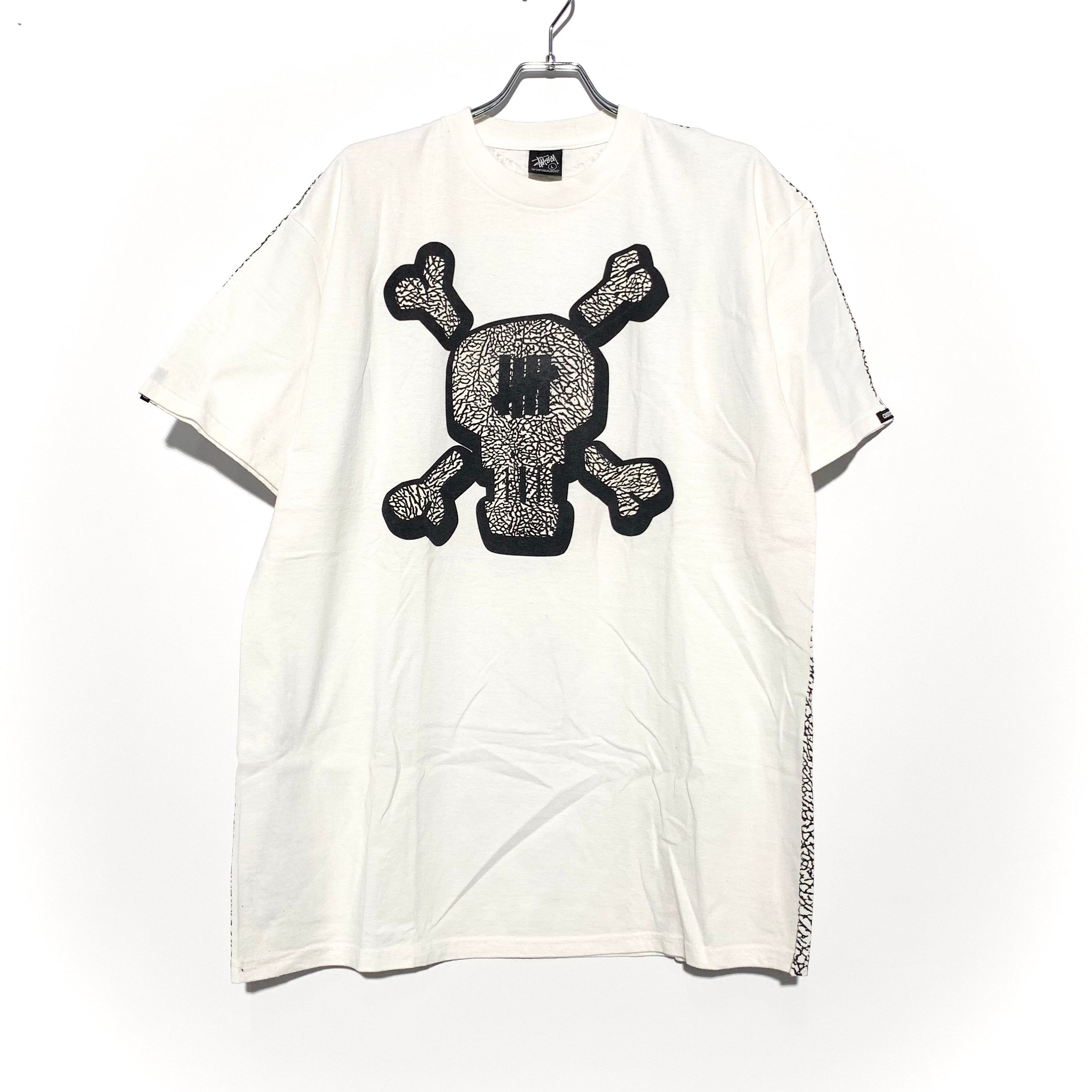 STUSSY UNLDEFEATED SKULL PRINT TEE White