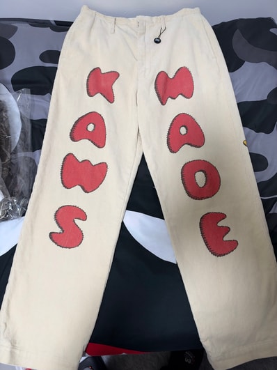 HUMAN MADE x KAWS CORDUROY PRINT PANTS "Beige"