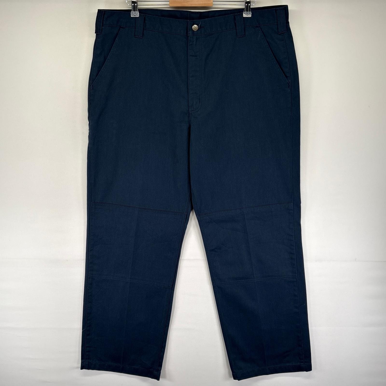 古着 カーハート Carhartt パンツ ワークパンツ ワンポイントロゴ 大きいサイズ ジッパーフライ W42 L32  ネイビー系 メンズ