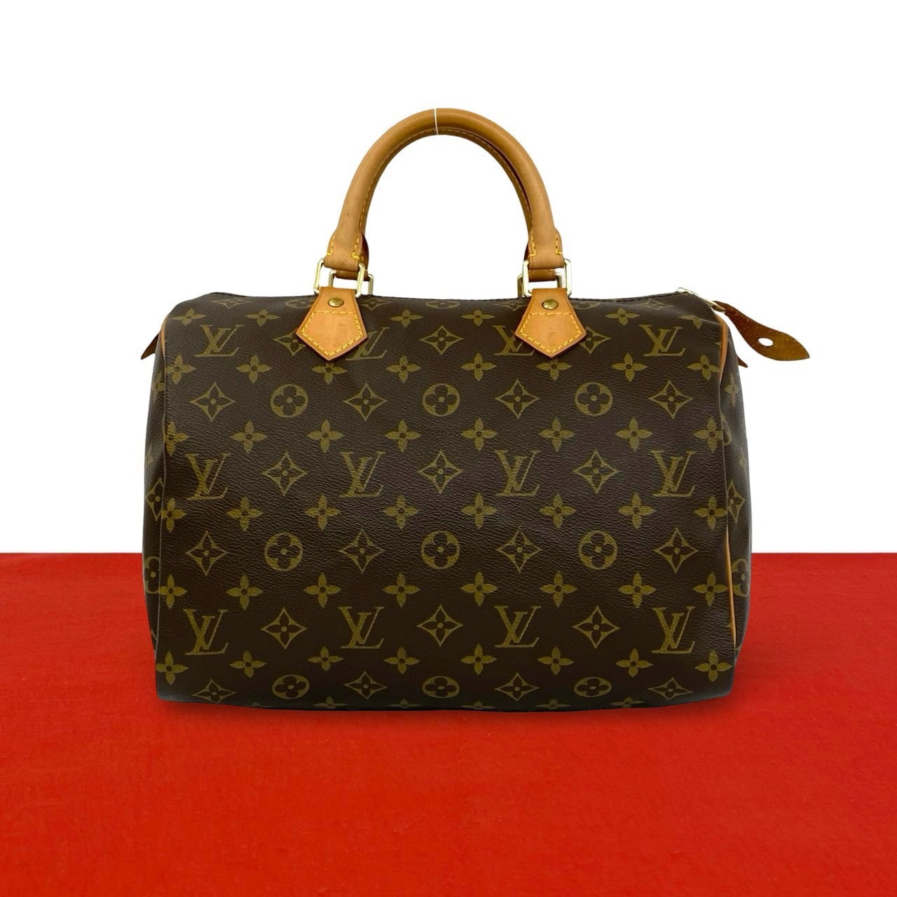 LOUIS VUITTON ルイヴィトン スピーディ 30 モノグラム レザー PVC ハンドバッグ ブラウン
 24714