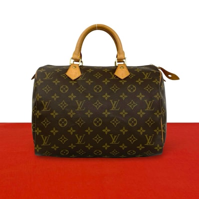 LOUIS VUITTON ルイヴィトン スピーディ 30 モノグラム レザー PVC ハンドバッグ ブラウン
24714