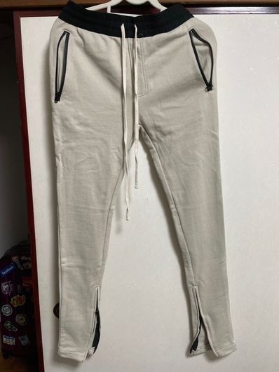 FEAR OF GOD Essentials Graphic Sweatpants "Cream"