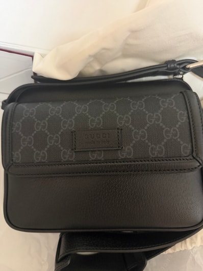 'GG SMALL' BLACK CROSSBODY BAG WITH LOGO PATCH IN LEATHER AND FABRIC MAN