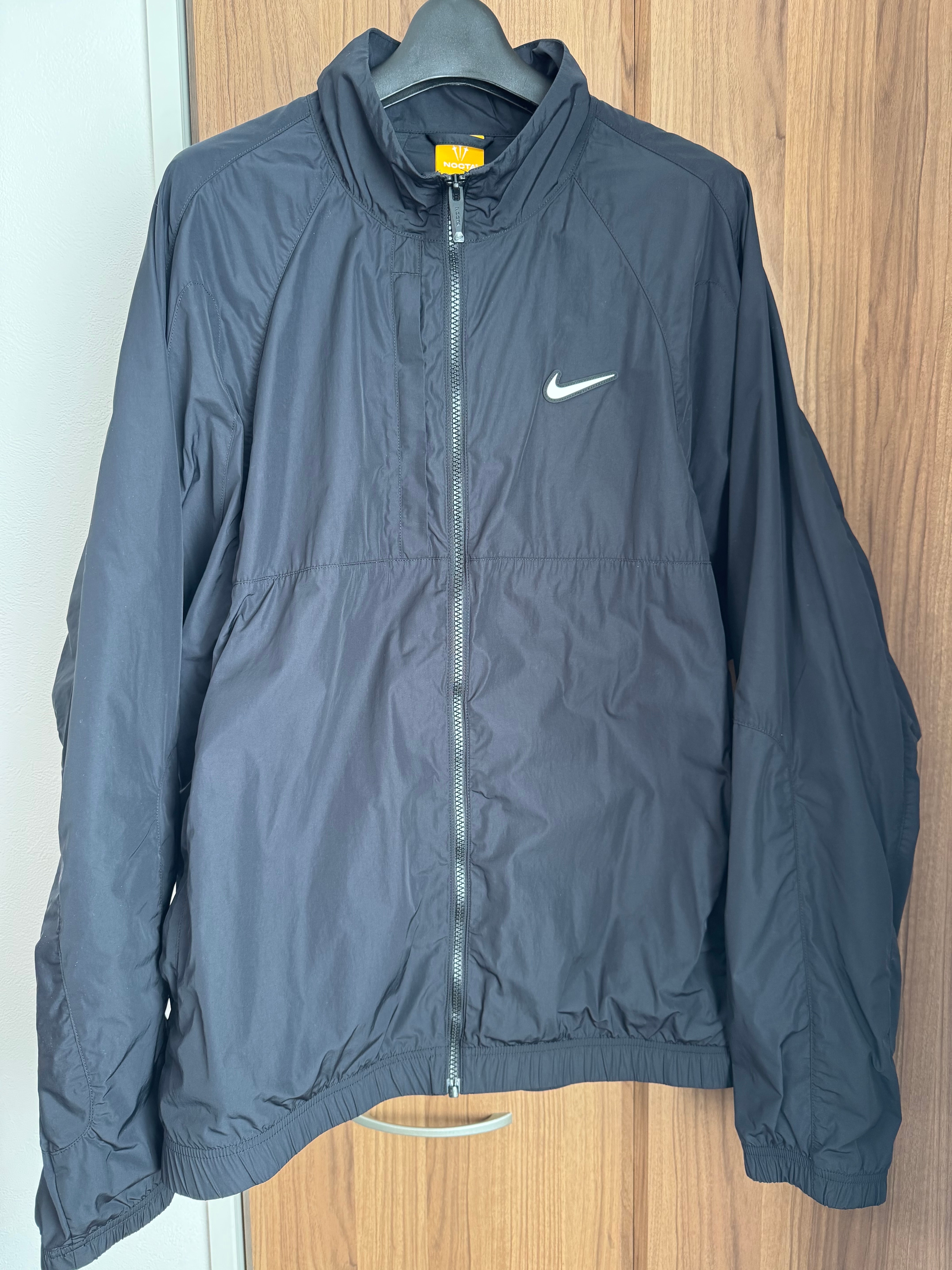 ナイキ x ドレイク ノクタ M NRG CS トラック ジャケット ウーブン "ブラック" FN7666-010