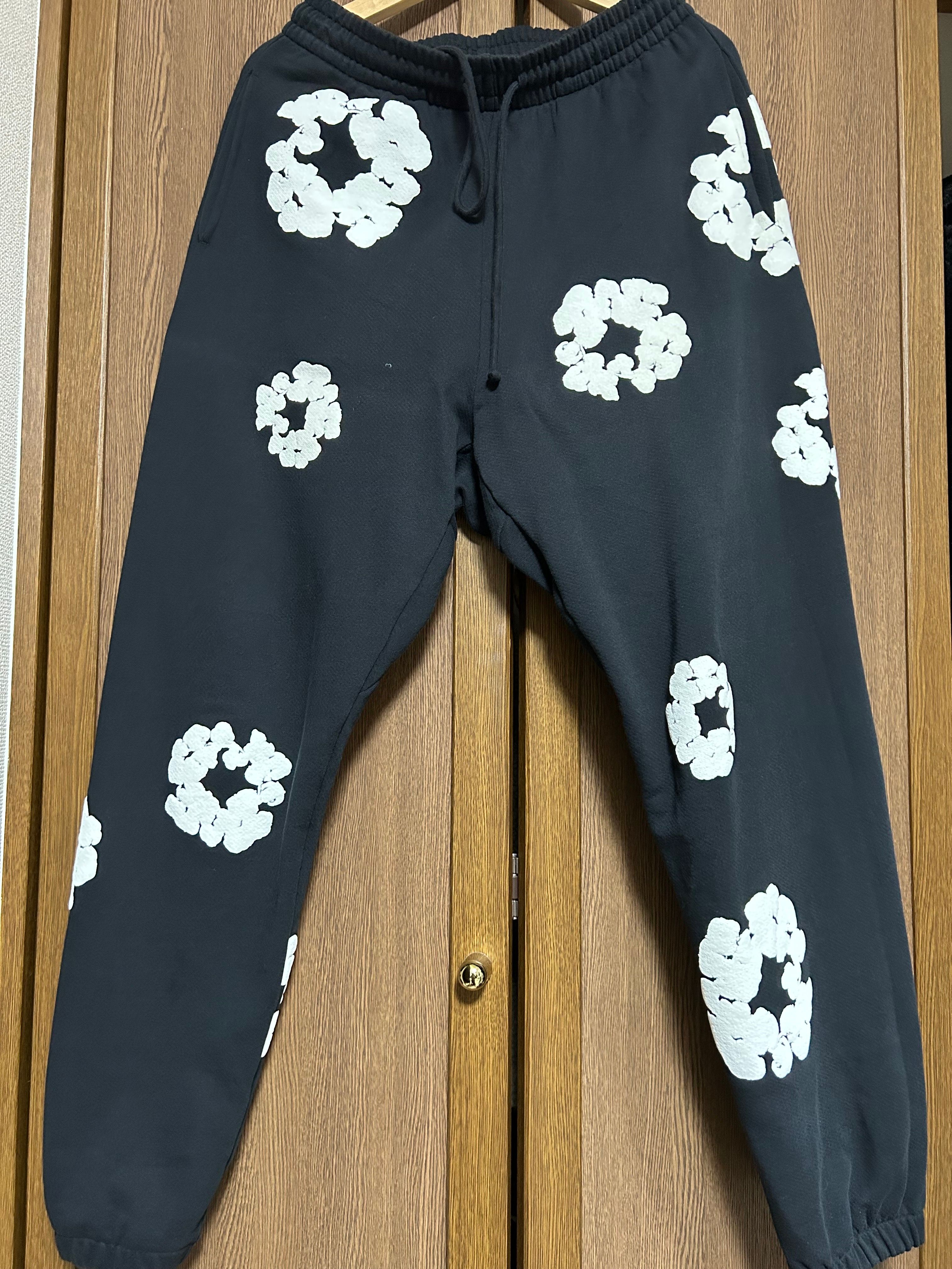 DENIM TEARS The Cotton Wreath Sweat Pants "Black"