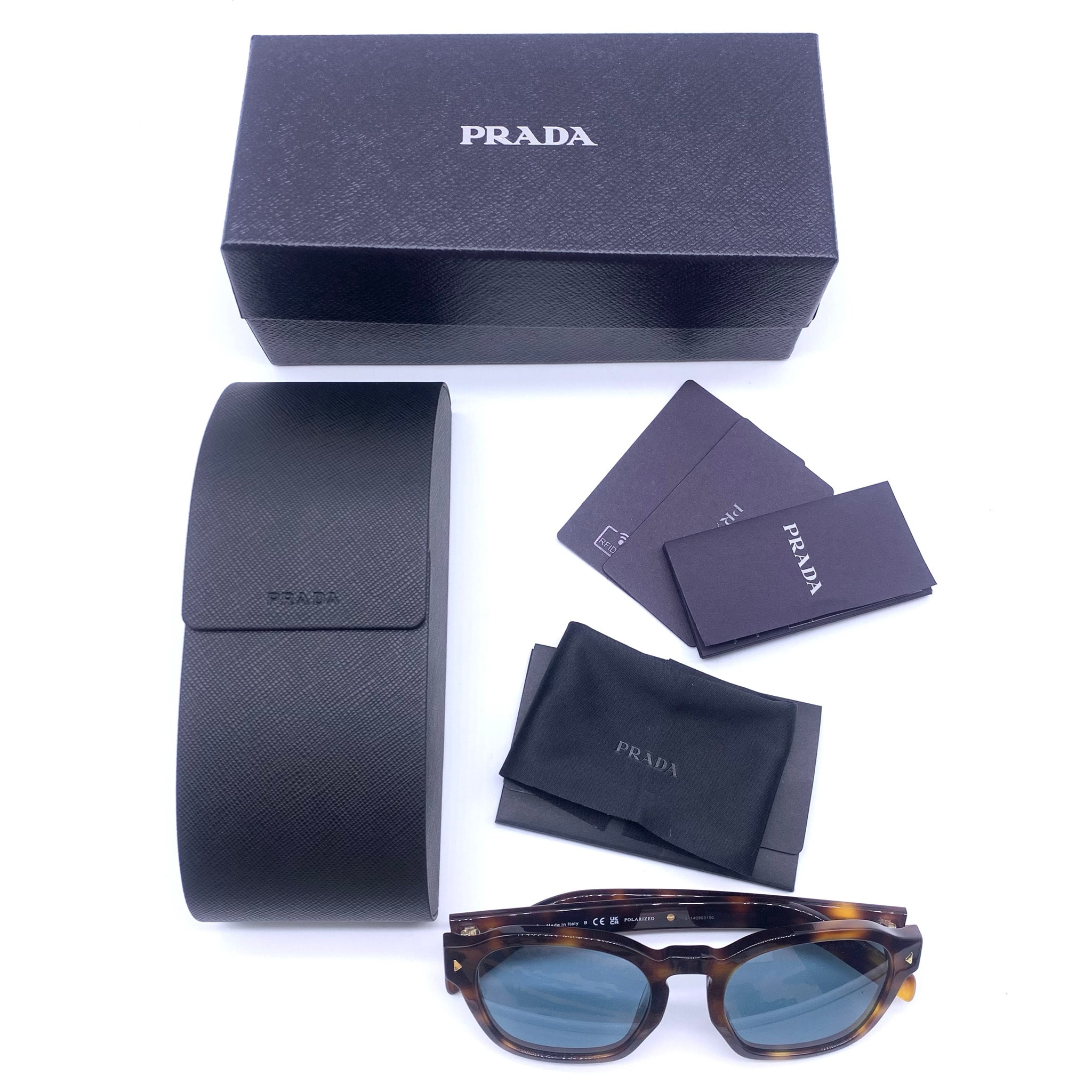 PRADA Sunglasses with the Iconic Metal Plaque "Turquoise Blue"