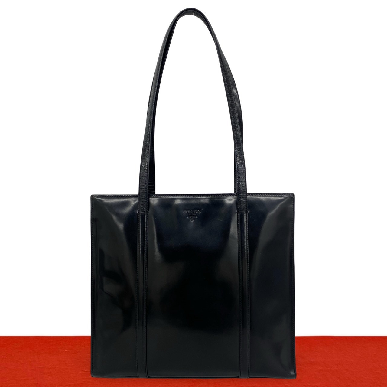 PRADA プラダ ロゴ 刻印 パテントレザー トートバッグ ブラック
35952