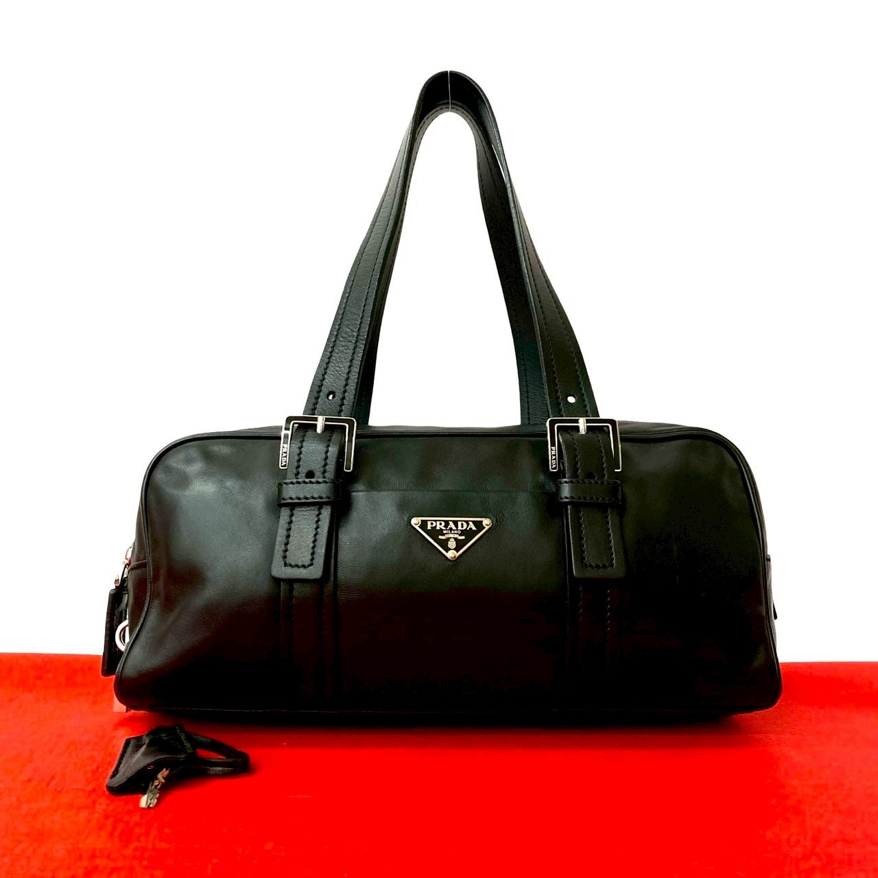 PRADA プラダ 三角ロゴ 金具 レザー ハンドバッグ ブラック
 27305