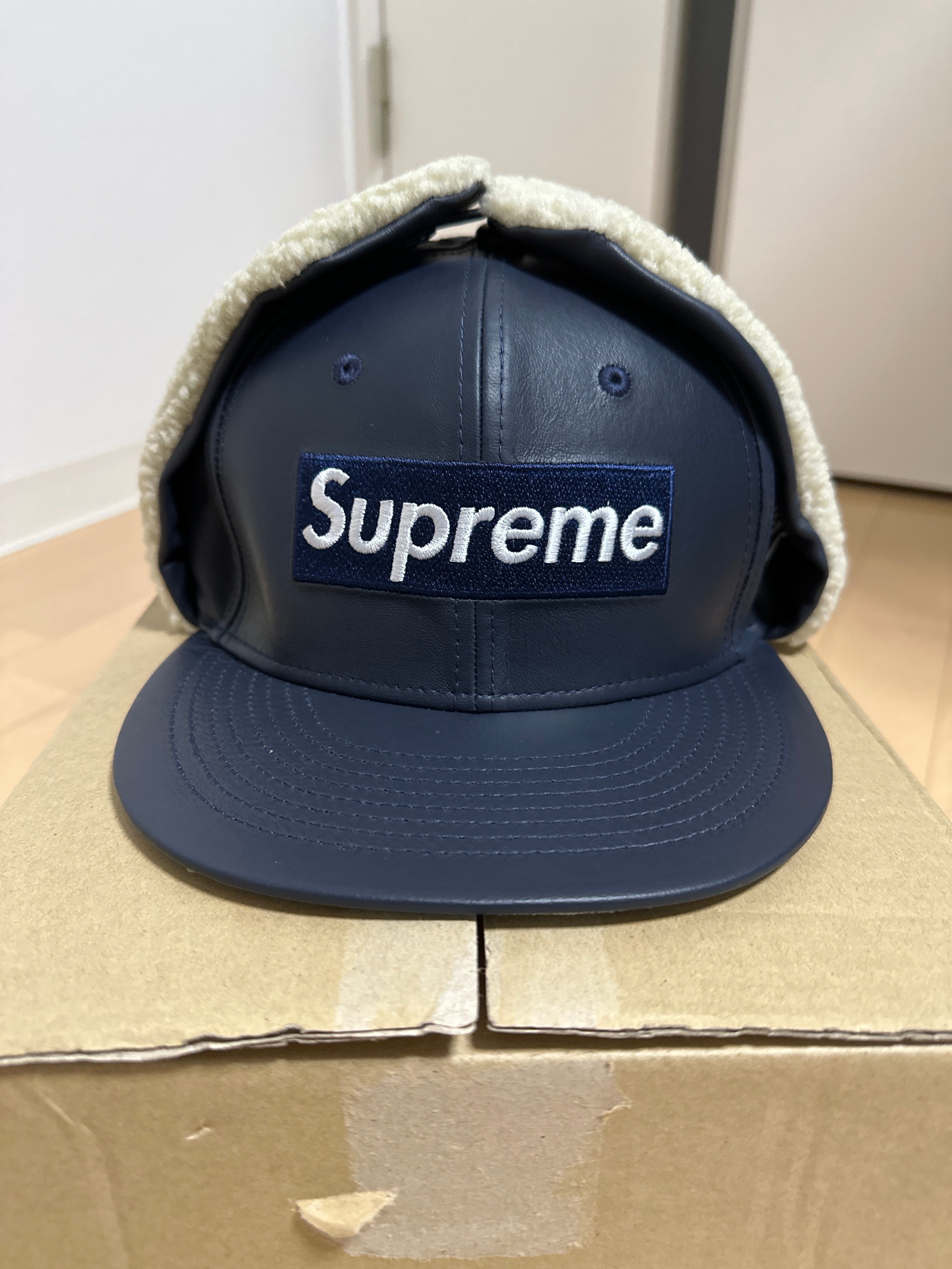 Supreme Leather Earflap Box Logo New Era "Navy"