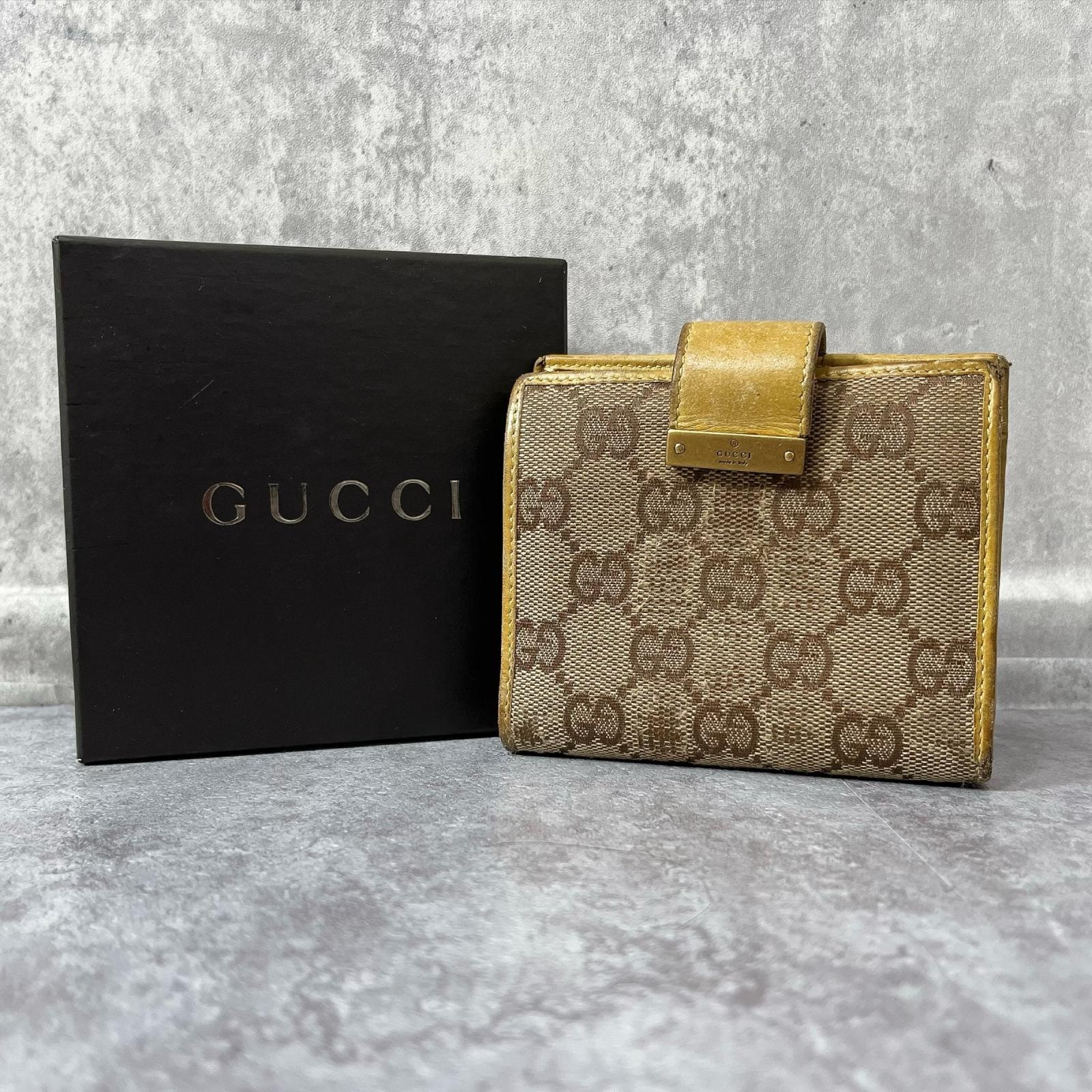 【GUCCI】グッチ 二つ折り財布 箱付き GGキャンバス GG柄 ロゴプレート ベージュ イエロー キャンバス レザー ゴールド金具 レディース