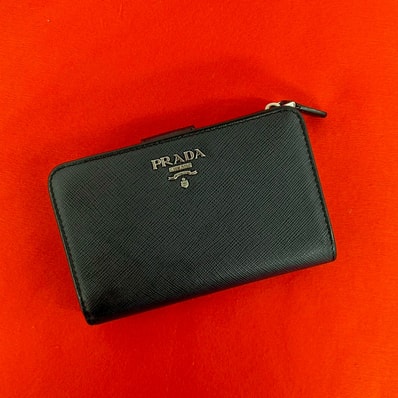 PRADA プラダ サフィアーノ レザー 二つ折り財布 ネイビー
24344