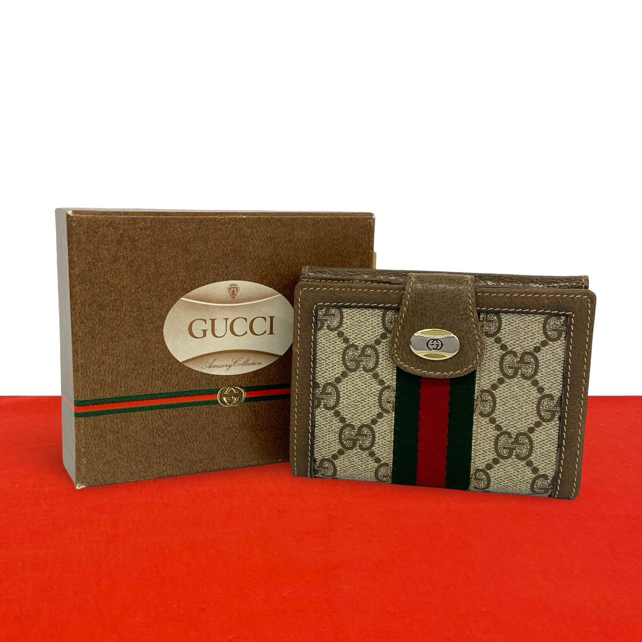 GUCCI グッチ シェリーライン GG 柄 ロゴ レザー PVC 二つ折り財布 ブラウン
 30268