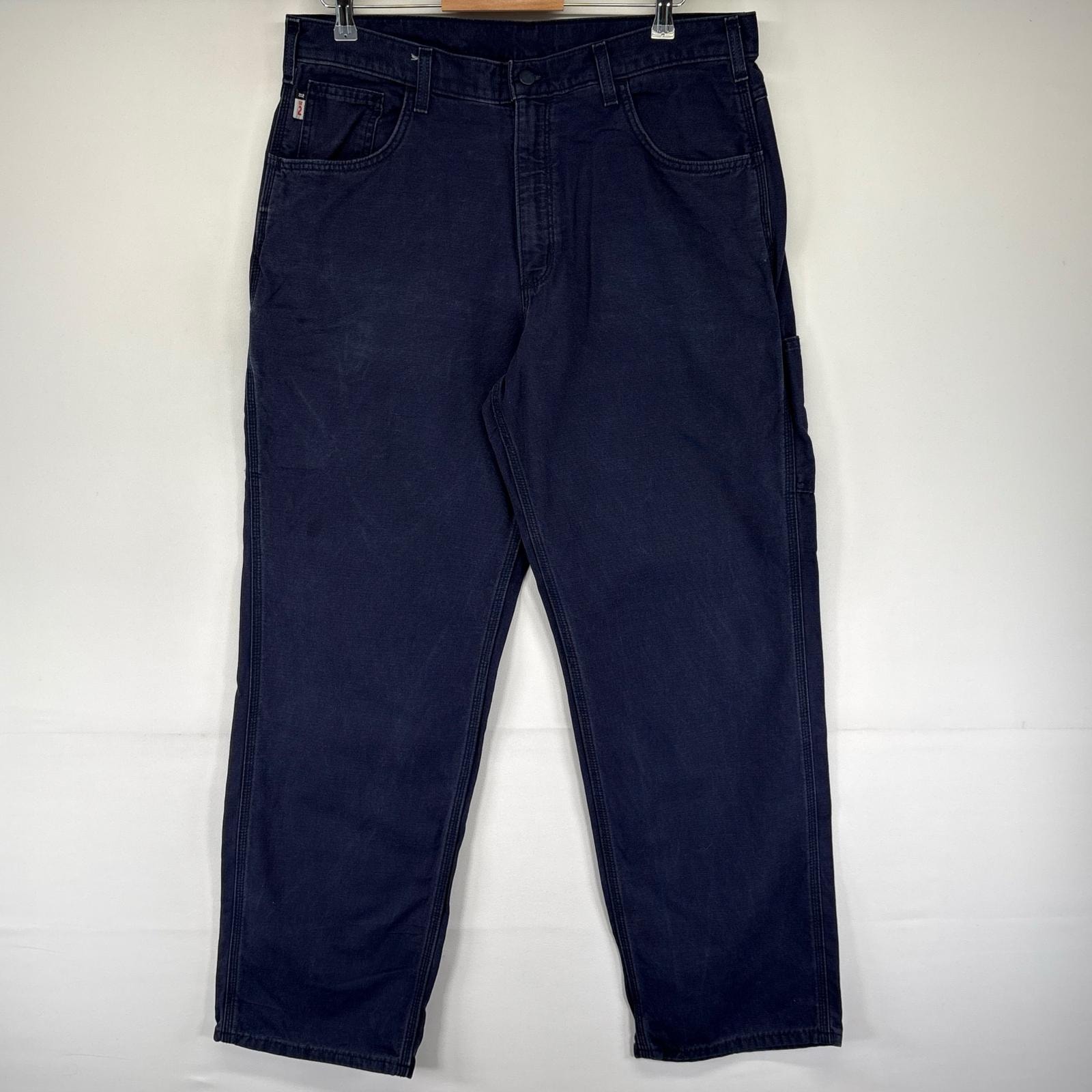 古着 カーハート Carhartt ダック パンツ ジッパーフライ ワーク ワンポイントロゴ 5ポケット w36 L32  ネイビー系 メンズ