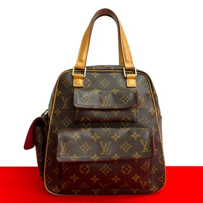 LOUIS VUITTON ルイヴィトン エクサントリ シテ モノグラム レザー PVC ハンドバッグ ブラウン
2313a