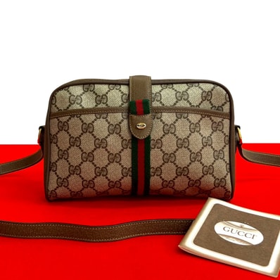 GUCCI グッチ シェリーライン GG ロゴ 金具 レザー PVC ショルダーバッグ ブラウン
88864