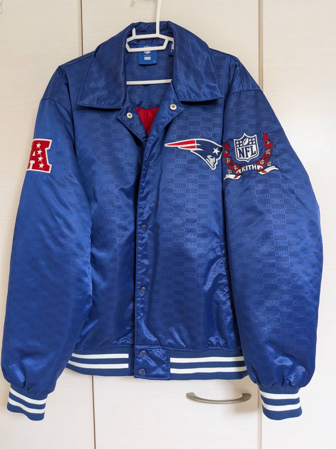 Kith x the NFL: Patriots Satin Bomber Jacket "Action"