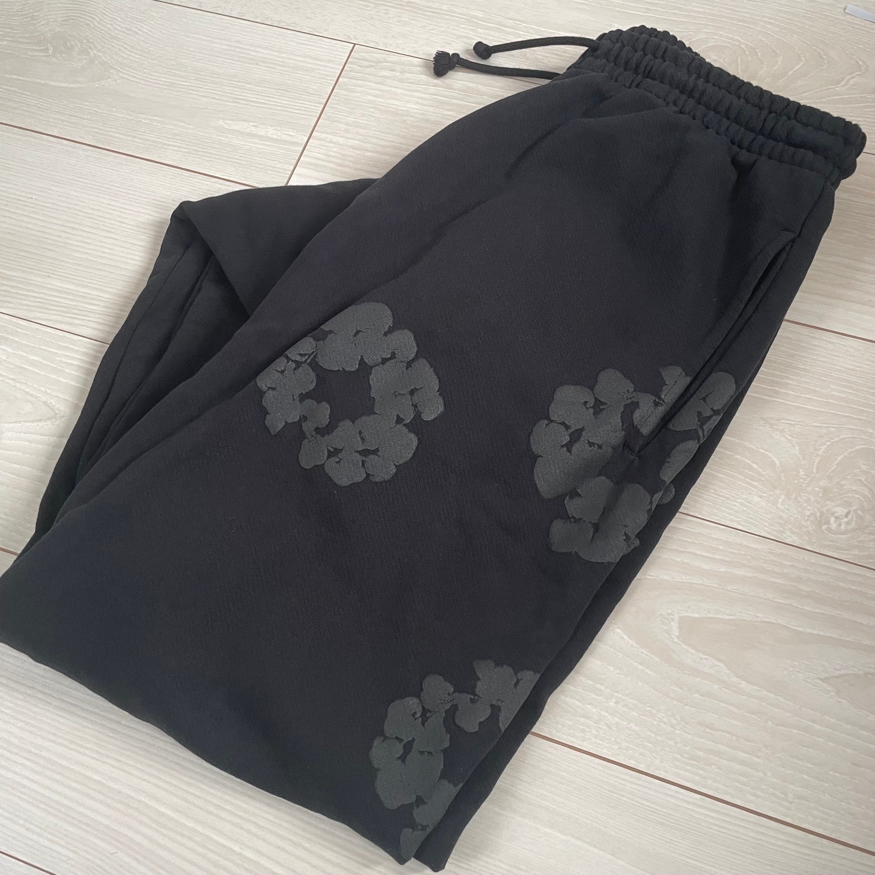 デニムティアーズ モノ リース スウェットパンツ "ブラック"