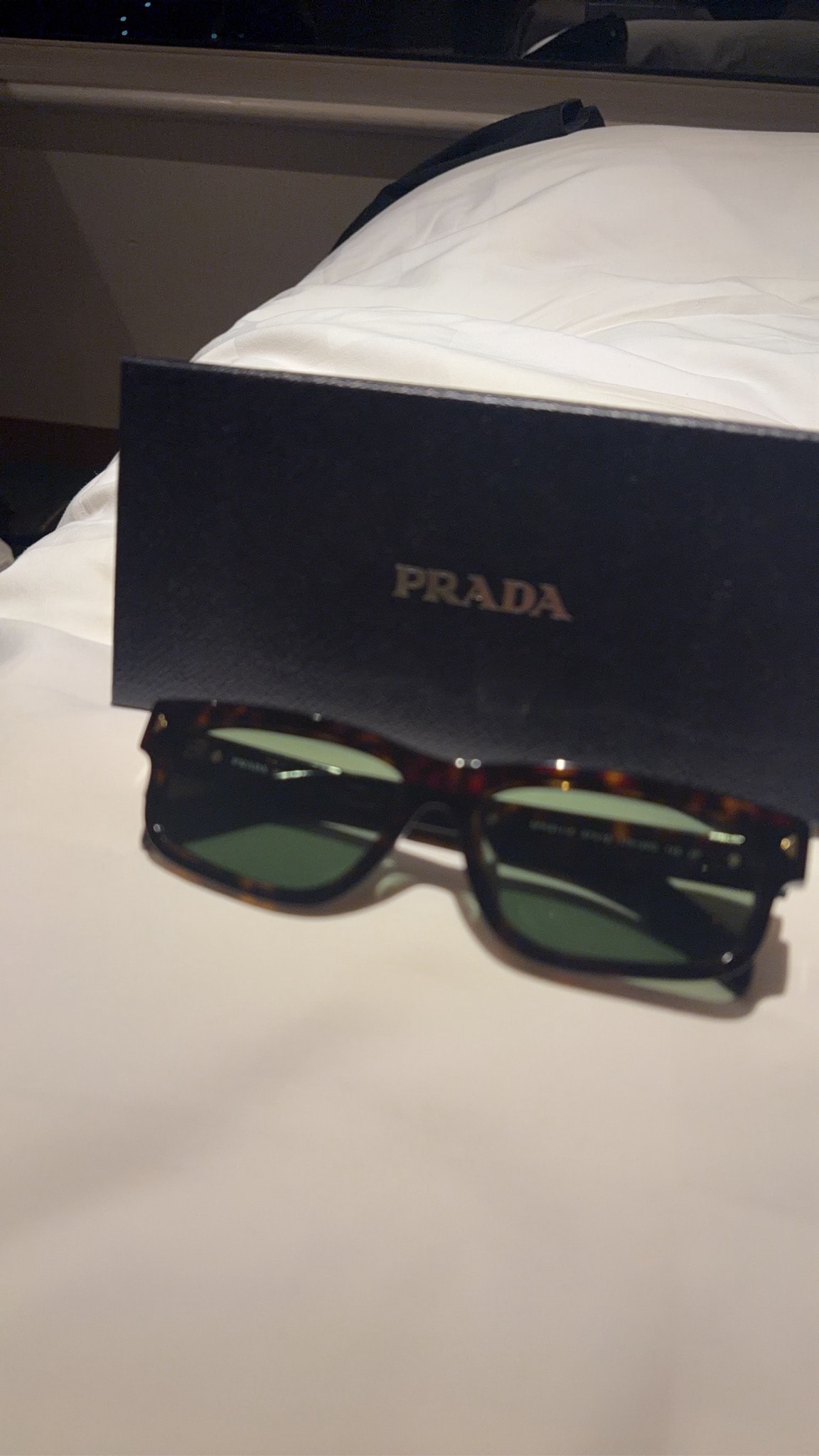 PRADA Sunglasses with The Iconic Metal Plaque "Willow Green"