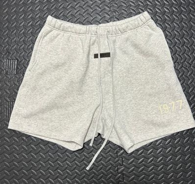 FEAR OF GOD ESSENTIALS 1977 SHORTS "Light Oatmeal"